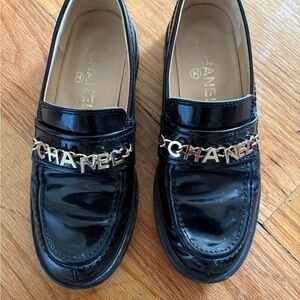 CHANEL Black Patent Leather Loafers with Gold Chain